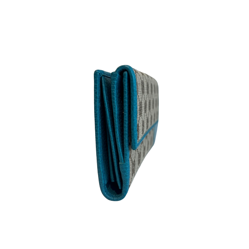 A folded wallet shown from the side on a plain white background.
