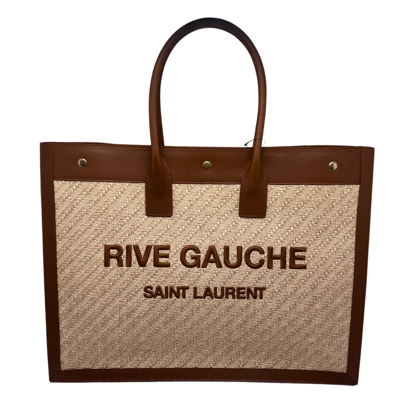 Rive Gauche Saint Laurent Tote Beige Exterior Leather Features Tubular Leather Handles Gold-Toned Buttons Three Snap Button Closures Brown Canvas Interior Hanging Pocket in Interior