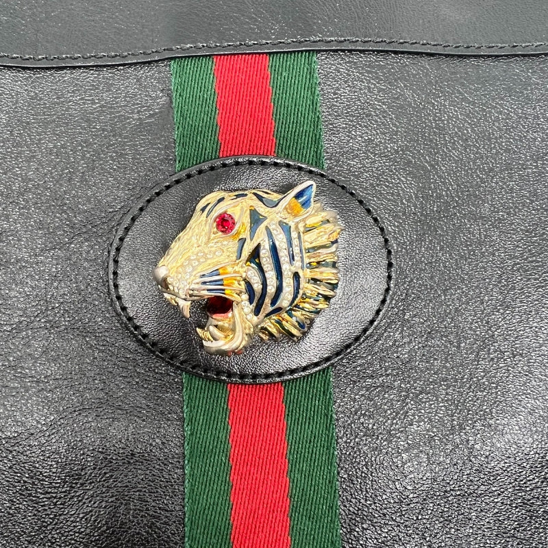 Gucci Rajah Large Tote  Black Leather Exterior  Gold Toned Hardware   Green and Red Fabric Strip Down Front and Back Exterior   Bedazzled Tiger on Front Exterior   Double Gold Toned Chain Should Straps with Leather Rests   Interior Button Closure  Brown Suede Interior   Interior Detachable Wallet with Black Leather Exterior, Gold Zipper, Brown Suede Interior 