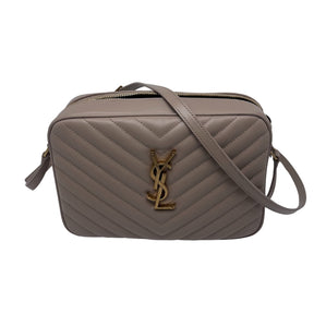 Saint Laurent Crossbody Bag Neutral Leather Gold-Tone Hardware Single Adjustable Shoulder Strap Tassel Accent Single Exterior Pocket Grosgrain Lining Single Exterior Pocket Zip Closure at Top