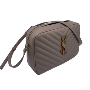 Saint Laurent Crossbody Bag Neutral Leather Gold-Tone Hardware Single Adjustable Shoulder Strap Tassel Accent Single Exterior Pocket Grosgrain Lining Single Exterior Pocket Zip Closure at Top