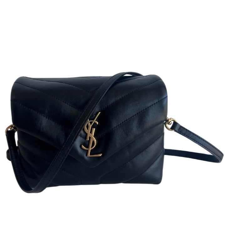 Saint Laurent Shoulder Bag&nbsp;  Black Calfskin  Gold-Toned Hardware  Removable Shoulder Strap&nbsp;  Snap Closure at Front&nbsp;  Dual Interior Pockets  Dustbag Included&nbsp;