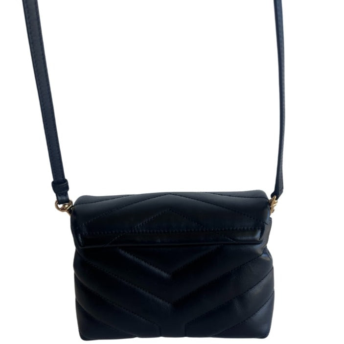 Saint Laurent Shoulder Bag&nbsp;  Black Calfskin  Gold-Toned Hardware  Removable Shoulder Strap&nbsp;  Snap Closure at Front&nbsp;  Dual Interior Pockets  Dustbag Included&nbsp;