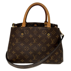 Louis Vuitton Montaigne BB&nbsp;  Brown Coated Canvas  Gold-Hardware  Leather Trim Embellishment&nbsp;  Rolled Handles&nbsp;  Single Shoulder Strap  Suede Lining&nbsp;  Interior Pockets  One Center Zip Pocket&nbsp;