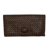 Bottega Vaneta Braided Clutch

Brown Leather

Intrecciato Weave

Suede Lining

Single Interior Pocket&nbsp;

Turn-Lock Closure at Front&nbsp;