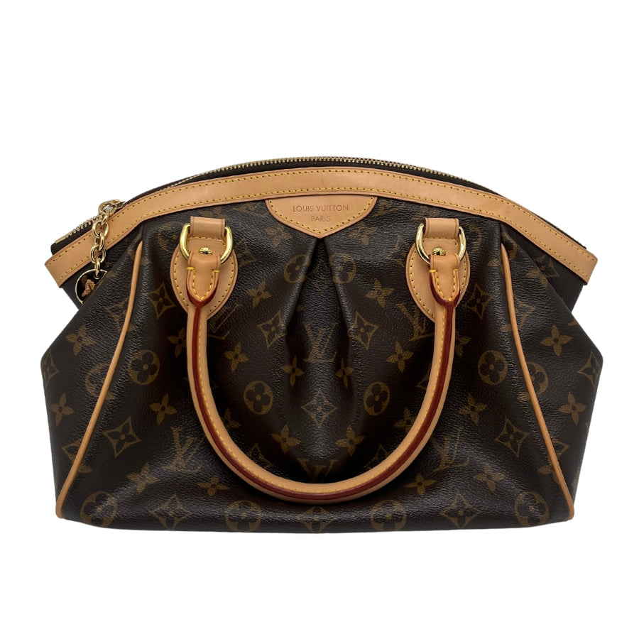 Louis Vuitton Monogram Tivoli PM, Brown Coated Canvas Exterior, LV Monogram, Brass Hardware, Rolled Handles, Canvas Lining, Three Interior Pockets, Top Zip Closure, Dust Bag Included, Condition: Excellent