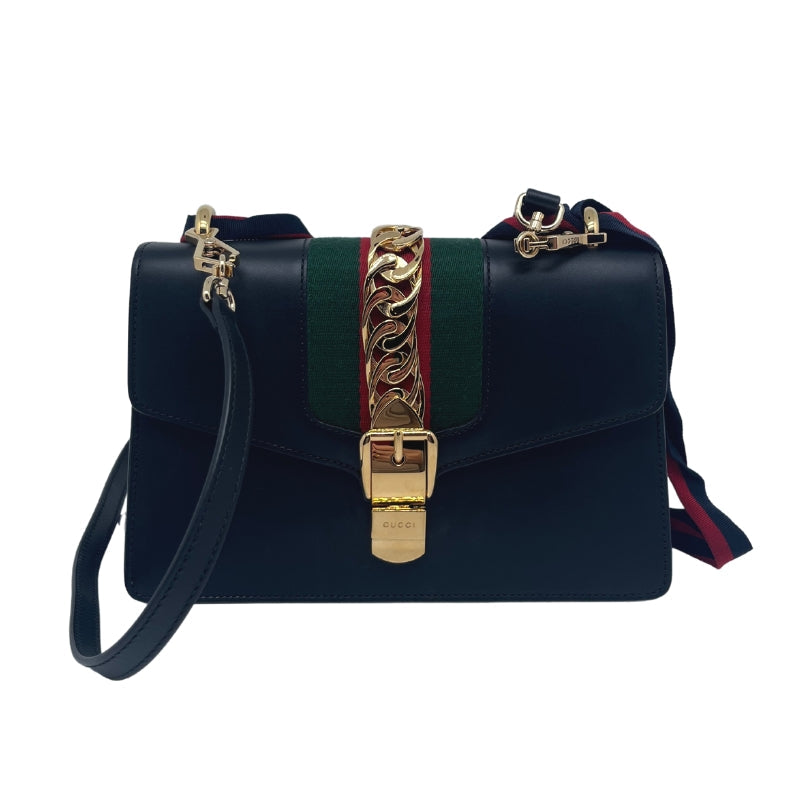 Gucci Small Sylvie Shoulder Bag, Navy Leather Exterior, Gold Hardware, Chain Link Accent, Single Shoulder Strap, Suede Lining, Dual Interior Pockets, Condition Excellent