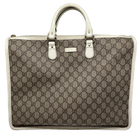 Gucci monogram tote, beige gg monogram coated canvas exterior, white leather trim, rolled handles, top zip closure, brass hardware, single interior pockets, condition great, front view