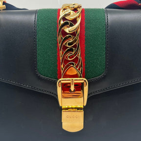 Gucci Small Sylvie Shoulder Bag, Navy Leather Exterior, Gold Hardware, Chain Link Accent, Single Shoulder Strap, Suede Lining, Dual Interior Pockets, Condition Excellent