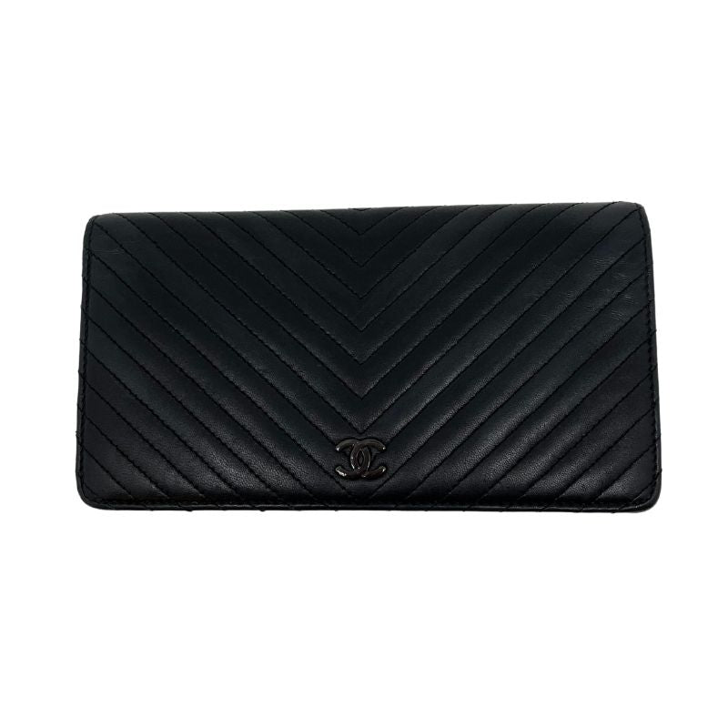 Chanel Chevron Leather Bifold Wallet in black leather with gunmetal hardware and interior card slots. Excellent condition