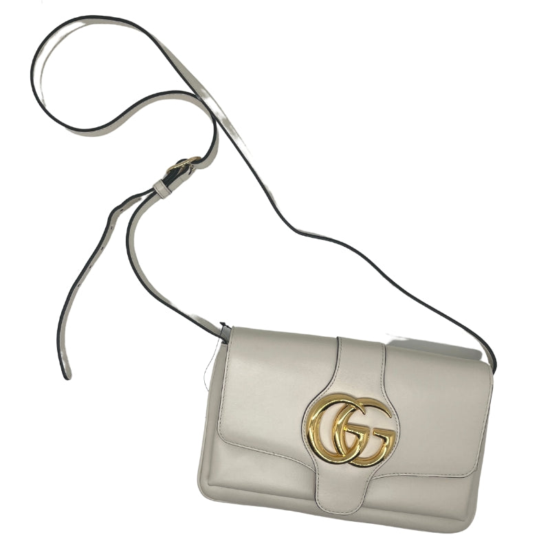 Gucci Small Arli Flap Bag, Neutral Calfskin Exterior, Gold-Tone Hardware, GG Logo, Single Adjustable Shoulder Strap, Jacquard Lining, Single Interior Pocket, Snap Closure at Front