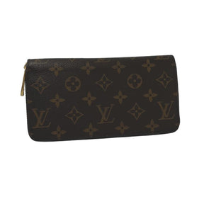 Louis Vuitton zipper wallet, brown lv logo coated canvas exterior, brass hardware, red leather interior, four interior pockets with card slots, exposed zipper closure, condition excellent, front view
