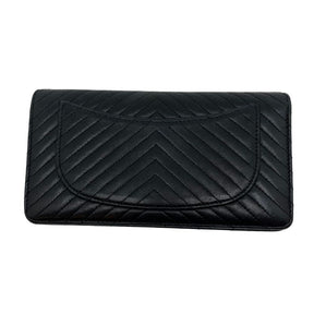 Chanel Chevron Leather Bifold Wallet in black leather with gunmetal hardware and interior card slots. Excellent condition