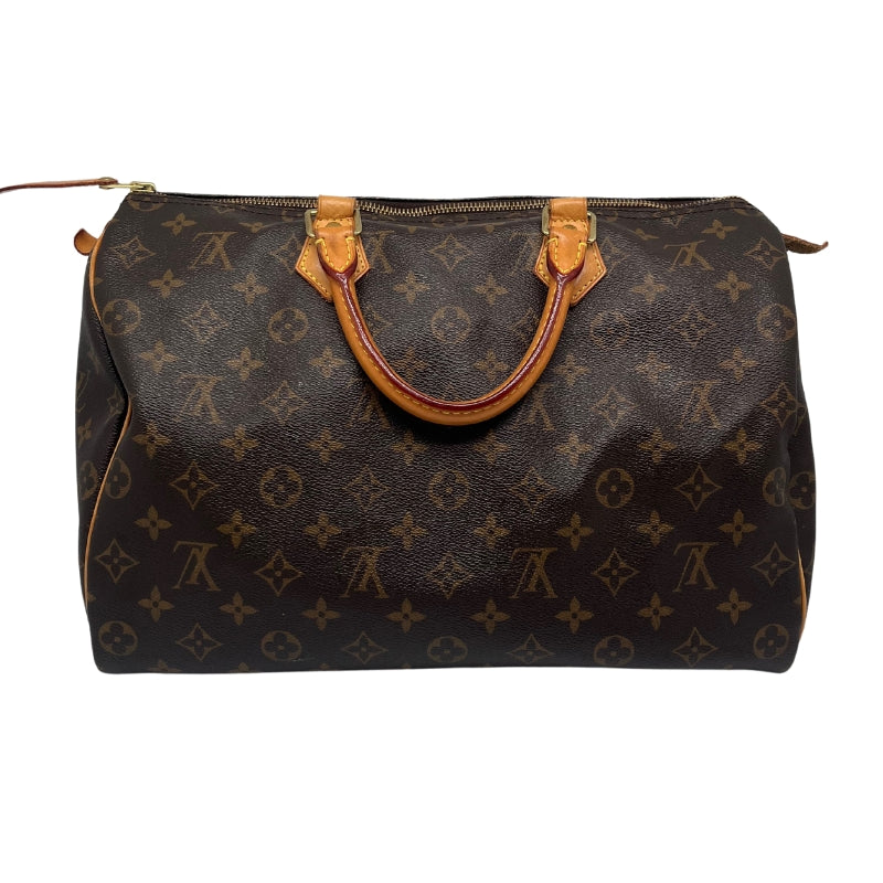 Louis Vuitton Monogram Speedy 35  Coated Canvas Exterior  LV Monogram  Brass Hardware  Leather Trim  Rolled Handles  Canvas Lining  Single Interior Pocket  Zip Closure at Top  Box and Dust Bag Included  Condition: Excellent