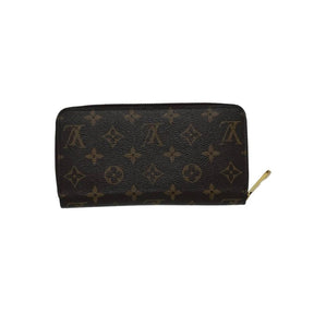 Louis Vuitton zipper wallet, brown lv logo coated canvas exterior, brass hardware, red leather interior, four interior pockets with card slots, exposed zipper closure, condition excellent, back view