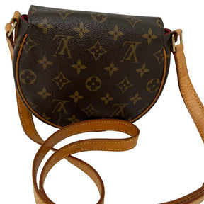 Louis Vuitton Monogram Tambourine Crossbody Bag with brown leather, LV monogram, leather adjustable strap, buckle closure at front, single interior pocket. Great condition