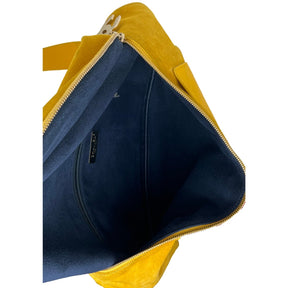 Interior View: Blue Fabric, One Large Zippered Pocket. 
