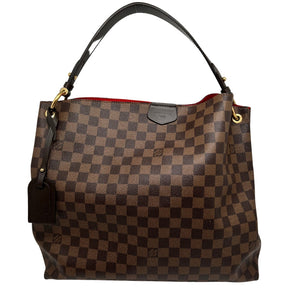 Front View: Damier Canvas in Brown, Brass Hardware, Brown Leather Shoulder Strap, Luggage Tag. 