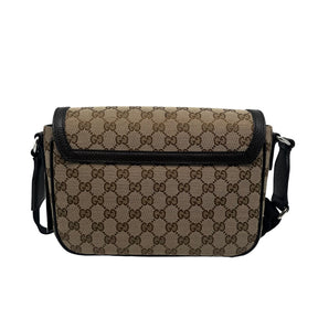 Gucci GG Canvas Messenger Flap Bag, Brown Canvas Exterior, GG Logo, Silver Tone Hardware, Single Adjustable Shoulder Strap, Leather Trim Embellishment, Canvas Lining, Three Interior Pockets, Snap Closure at Front