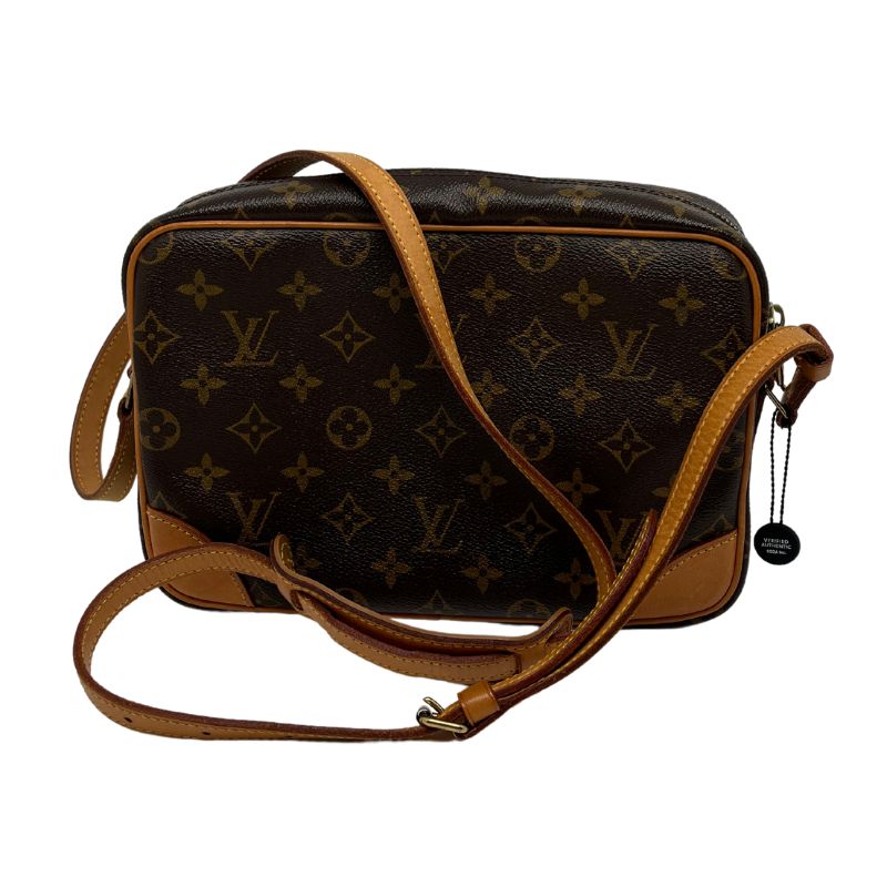 Louis Vuitton Monogram Trocadero 27 in brown coated canvas with leather trim, single adjustable shoulder strap, single exterior pocket, single interior pocket, leather lining. Great condition, some distressing on interior