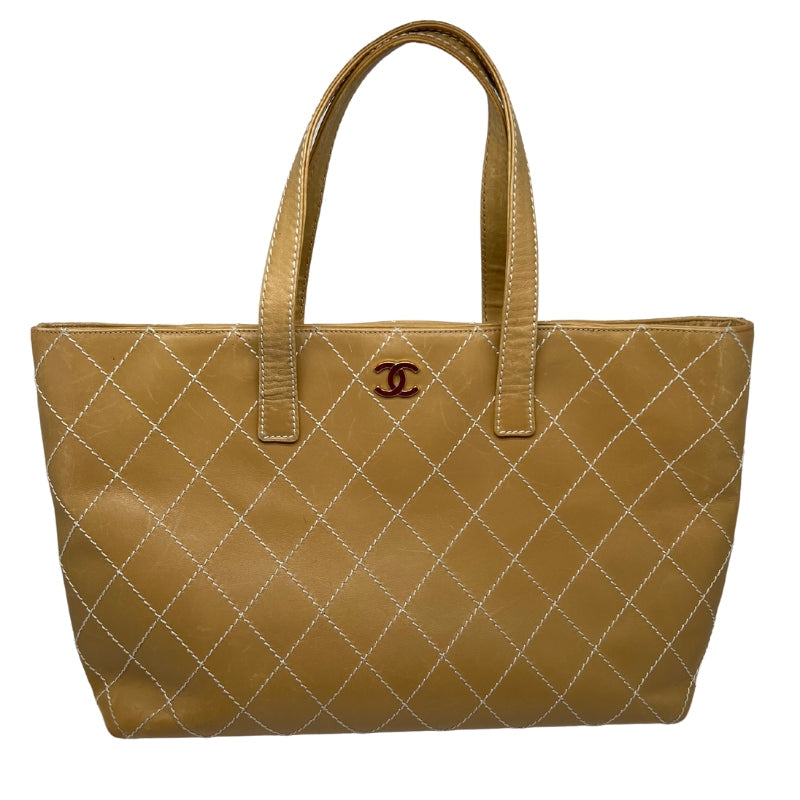 Front View: Neutral Leather, Interlocking CC Logo, Gold-toned Hardware, Dual Shoulder Straps.