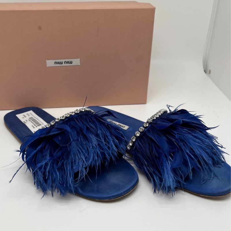 Miu Miu blue satin slides with feather and jewel details. Size 40 in great condition
