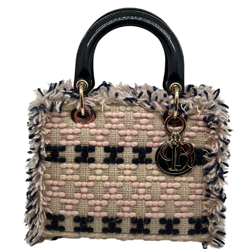 Front View: Multicolor Woven Tweed, Patent Leather Handles, Dior Charms, Gold-Toned Hardware. 