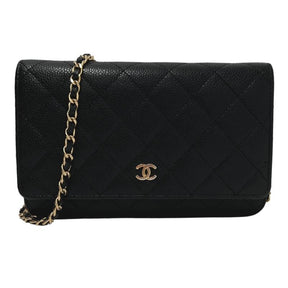 Chanel caviar wallet on chain, gold toned hardware, black quilted caviar leather, chain shoulder snap, single exterior pocket, dual interior pockets with card slots, flap closure at front, condition excellent, front view