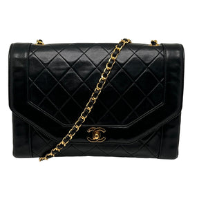 Front View: Quilted Lambskin, Gold Plated Chanel CC Logo on Front, Gold Chain Leather Threaded Shoulder Strap. 