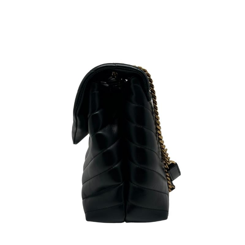 Saint Laurent medium loulou matelasse bag, black chevron quilted leather exterior, gold hardware, ysl gold logo at front closure, snap closure, chain straps, grosgrain lining, dual interior pockets, condition excellent, side view