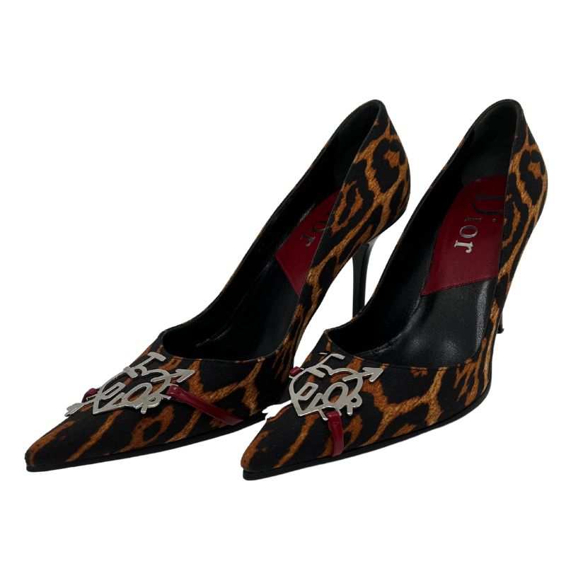 I Heart Dior animal print heels with pointed toe, animal print canvas, I Heart Dior hardware detail, and leather trim. Size 39, excellent condition