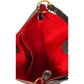 Interior View: Magnetic Leather Closure, Red Fabric Interior, Zipper Pocket. 