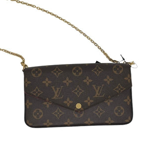 Louis Vuitton Monogram Pochette Felicie, Brown Coated Canvas, LV Monogram, Brass Hardware, Chain-Link Shoulder Strap, Canvas Lining, Snap Closure at Front, Canvas Card holder Insert, LV Monogram Coin Pouch Included, condition excellent