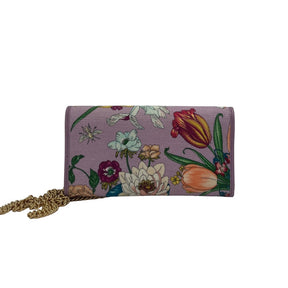 Gucci Flora Wallet on Chain Lavender Leather Exterior Printed Flora Pattern GG Logo Gold Tone HardWare Front Flap Snap Closure Chain Crossbody Strap Leather Lining Interior Zip Pocket Box Included Condition: Excellent