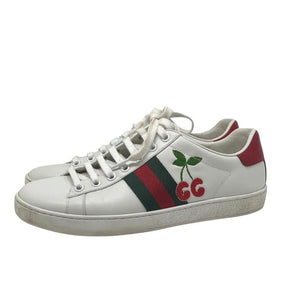 Gucci Ace Sneaker with Cherry Accent, Size 38, White Leather Exterior, Leather Lining, Rubber Sole, Signature Green and Red Stripe, Cherry Gucci Logo Patch, Red Leather Detail on Back, condition good with light wear