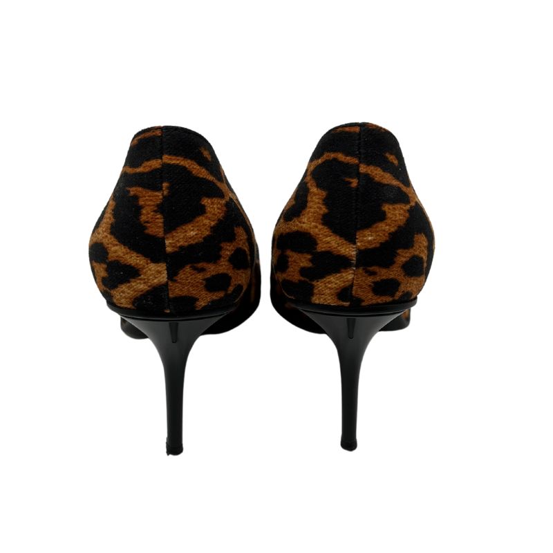 I Heart Dior animal print heels with pointed toe, animal print canvas, I Heart Dior hardware detail, and leather trim. Size 39, excellent condition