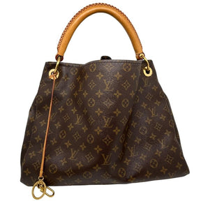 Louis Vuitton monogram artsy MM, brown LV logo coated canvas exterior, rolled handles, brass hardware, open top, alcantara lining, seven interior pockets, condition good, some distressing on sides, back view