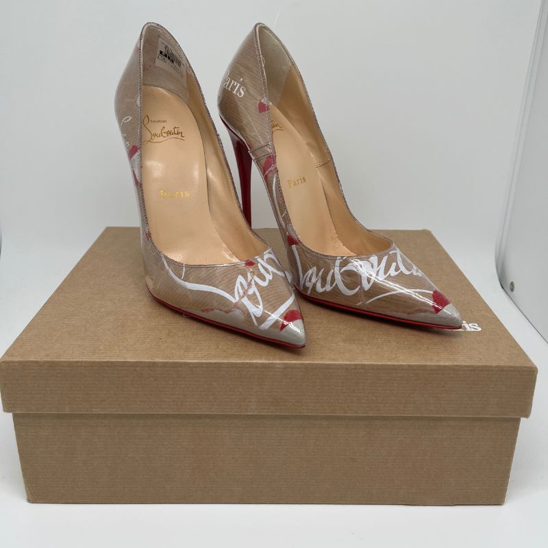 Christian Louboutin So Kate 120 PVC Pumps with pointed toe, 4.75" heel, and transparent exterior with distressed logo kraft paper. Like new in box
