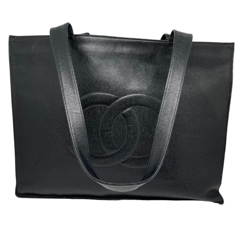 Chanel Leather CC Shopping Tote in black caviar leather with interlocking CC logo, dual shoulder straps, and open top. Great condition with some minor scuffs on back