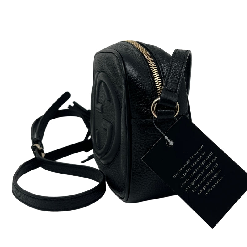 Gucci Soho Disco Crossbody Bag, Black Leather Exterior, GG Logo, Tassel Accent, Gold Tone Hardware, Single Adjustable Shoulder Strap, Canvas Lining, Dual Interior Pockets, Zip Closure at Top, Condition: Good