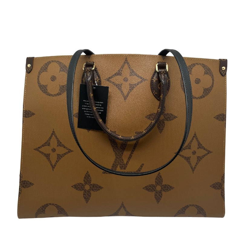 Louis Vuitton Monogram On The Go Tote, Brown Coated Canvas Exterior, Two-Toned, Brass Hardware, Leather Trim, Rolled Handles, Dual Shoulder Straps, Red Canvas Lining, Three Interior Pockets, Clasp Closure at Top, Condition Excellent