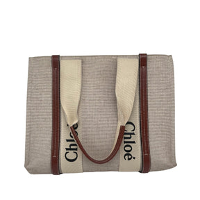Chloe Canvas Medium Woody Ribbon Tote Bag, Neutral Canvas Exterior, Graphic Print, Twill Lining, Single Interior Pocket, Leather Trim Embellishment, Open Top