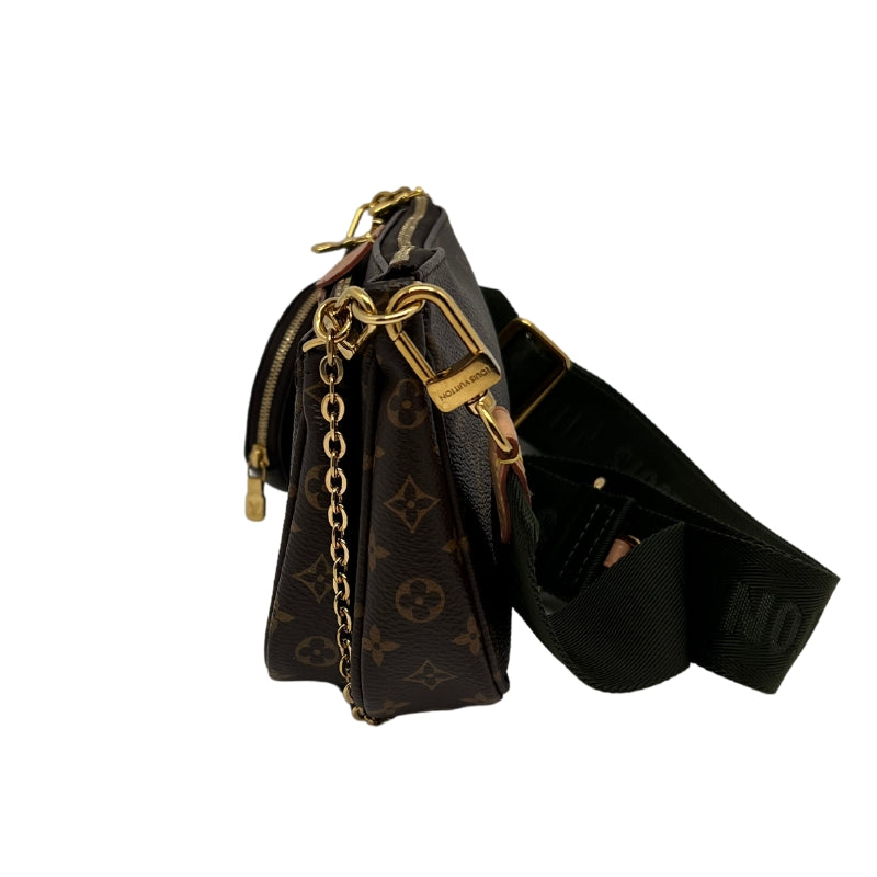 Side view: Louis Vuitton Multi Pochette Hybrid Crossbody Bag. Removable Coin Purse. Removable Mini Pochette Assessories. Removable Pochette Assessories. Chain Removable Strap. Army Green Removable Strap. Monogram Coated Canvas. Gold-Color Hardware.