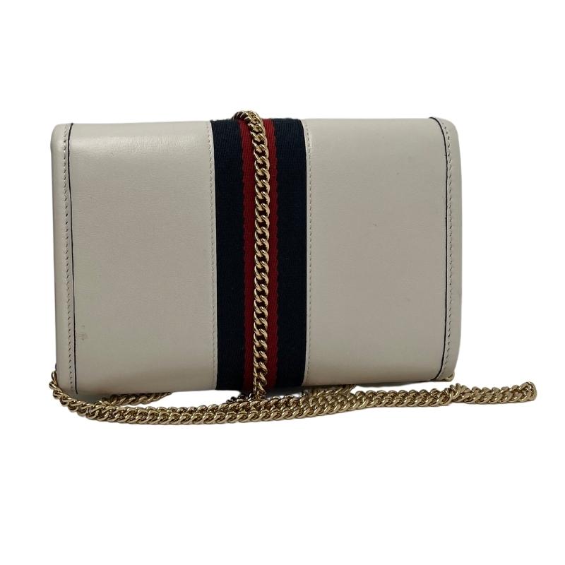 Gucci mini rajah chain bag, white leather exterior, green and red stripe down middle, gold hardware, gold tiger embellishment at front center, chain strap, suede lining, card slots, flap closure with snap at front, condition excellent, back view