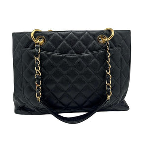 Chanel Caviar Grand Shopping Tote, Black Quilted Leather Exterior, gold Tote Hardware, Single Exterior Pocket, Chain Link Shoulder Straps, Satin Lining, Three Interior Pockets, Open Top, Interior Zipper Pocket, condition good