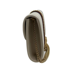 Gucci mini rajah chain bag, white leather exterior, green and red stripe down middle, gold hardware, gold tiger embellishment at front center, chain strap, suede lining, card slots, flap closure with snap at front, condition excellent, side view