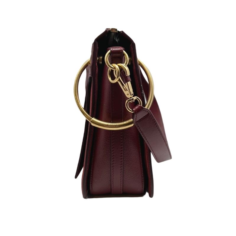 Chloe Medium Roy Bag, Merlot-Toned Leather, Gold-Tone Hardware, Suede Trim, Single Shoulder Strap, Single Exterior Pocket, Canvas Lining, Single Interior Pocket, Zip Closures at the Top, condition good with minor scratching