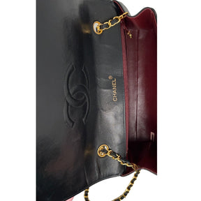 Interior View: Burgundy Leather Interior with Zipper and Patch Pockets. 