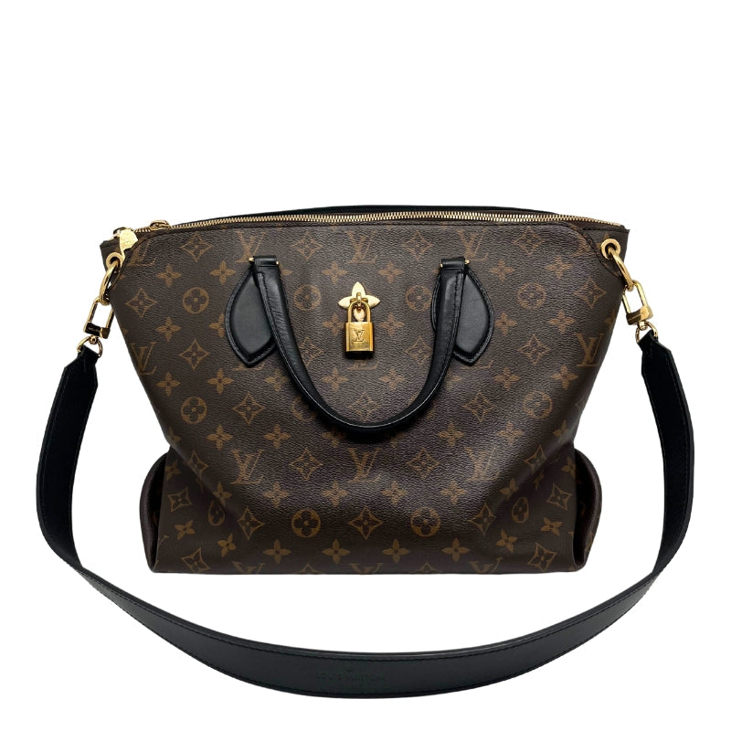 Louis Vuitton Monogram Flower Zipped Tote, Brown Coated Canvas Exterior, LV Monogram, Brass Hardware, Rolled Handles, Alcantara Lining, Four Interior Pockets, Zip Closure at Top, Condition: Excellent, Includes Box and Dustbag