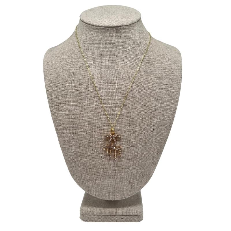 designer button necklace, authentic rhinestone chanel logo button, gold chain